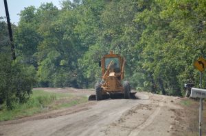 Backhoe type truck