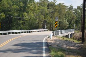 Bridge with guardrail