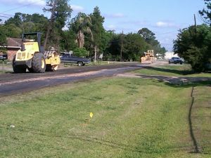 Construction trucks on road